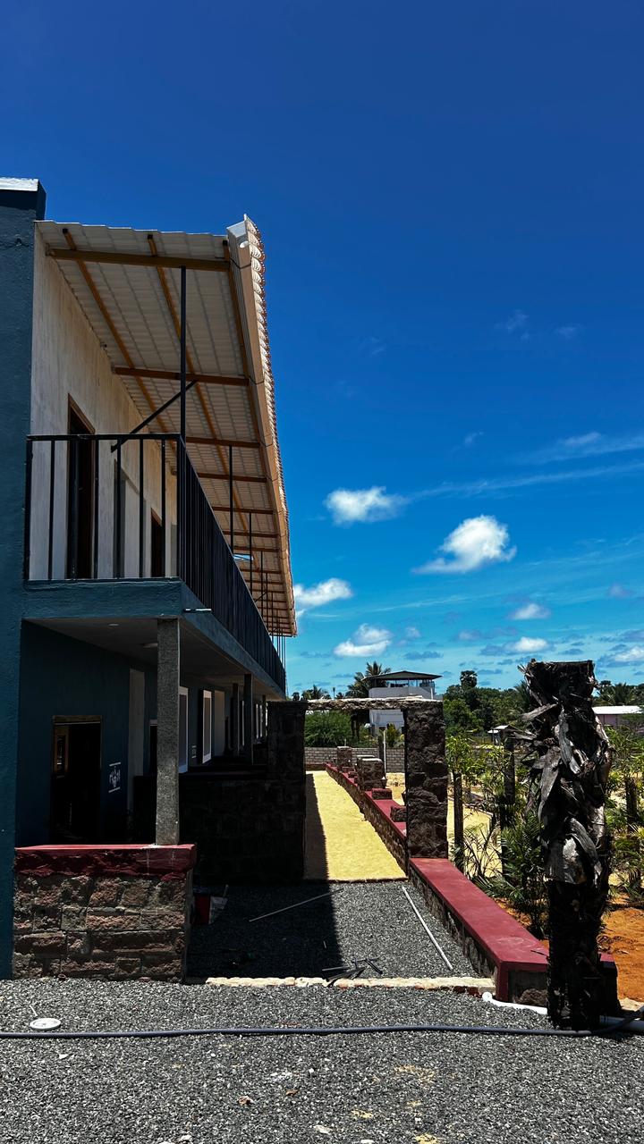 Tall side view of resort under blue sky